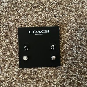 Never worn before coach stud set